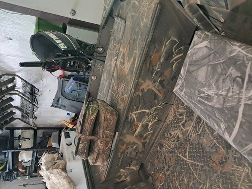 2011 16 ft.War Eagle boat motor and trailer 