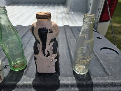 Antique Bottles including Grapette Elephant