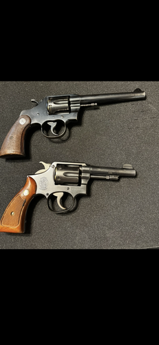 Colt 38 Police positive revolver and S&W Police 38 spl revolver
