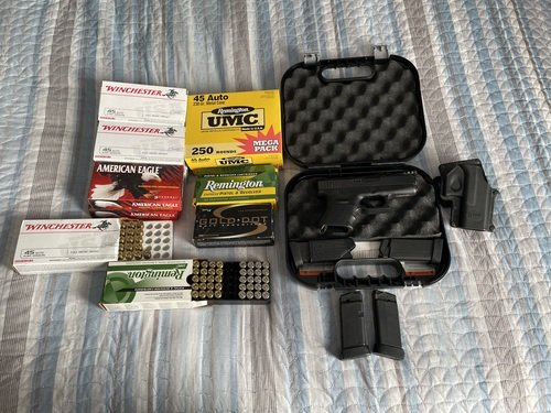 Glock 36 , 2 extra magazines, 725 rounds of ammunition 