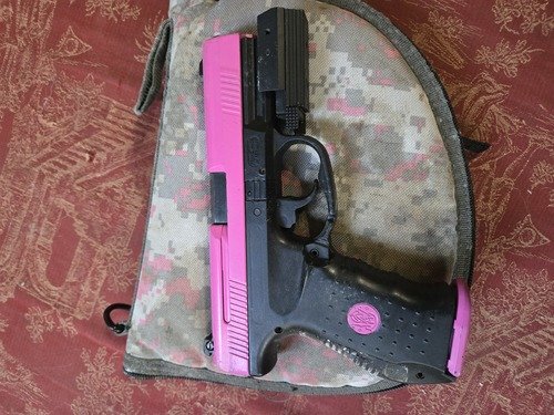 Smith and Wesson 40 cal, with soft case and ammo and laser. Laser needs new battery.  