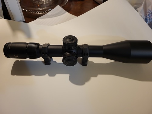 5x25x56 with 34mm tube.  Rings included 