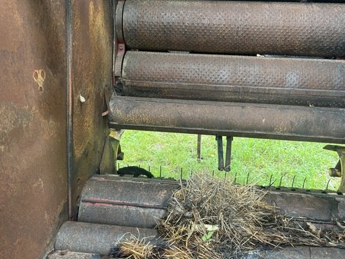 Burned 648 round baler 