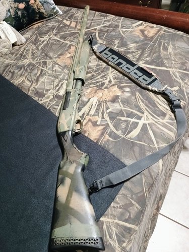 Remington Express 870 Super magnum 3 1/2 12Gauge  has a turkey choke black synthetic under camo pain