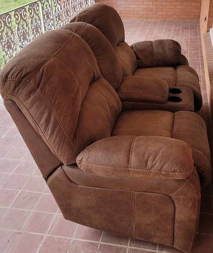 Dual rocking reclining love seat with console 