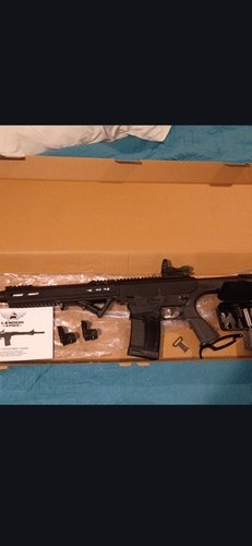 Trade for hand gun nice AK full automatic 12 gauge shoot gun 