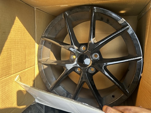 Corvette rims plus one spare