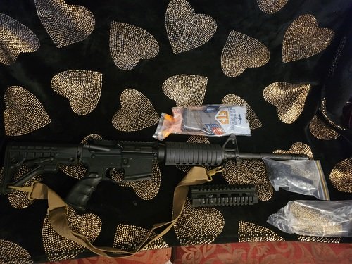 Plum crazy Firearms 5.56 rifle M4 configuration