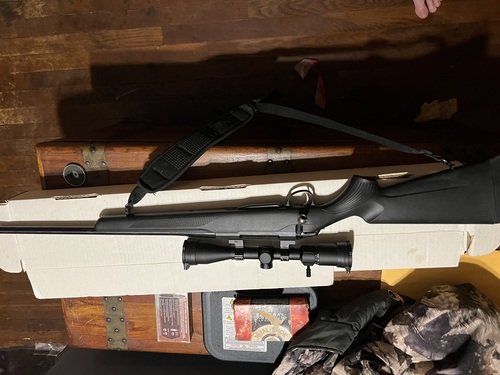 Tikka T3 .308 with 3-9x40 up Sig Sauer scope and ammo