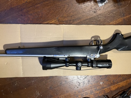 Savage stainless model 116 7mm magnum and ammo.