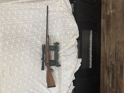 Remington 700 BDL 7MM MAGNUM..LEUPOLD 6-20-40 LR SF SCOPE..FACTORY BRAKE..TIMNEY TRIGGER