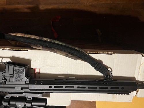 AR 15 5.56 with 1-6x23 Vortex scope.
